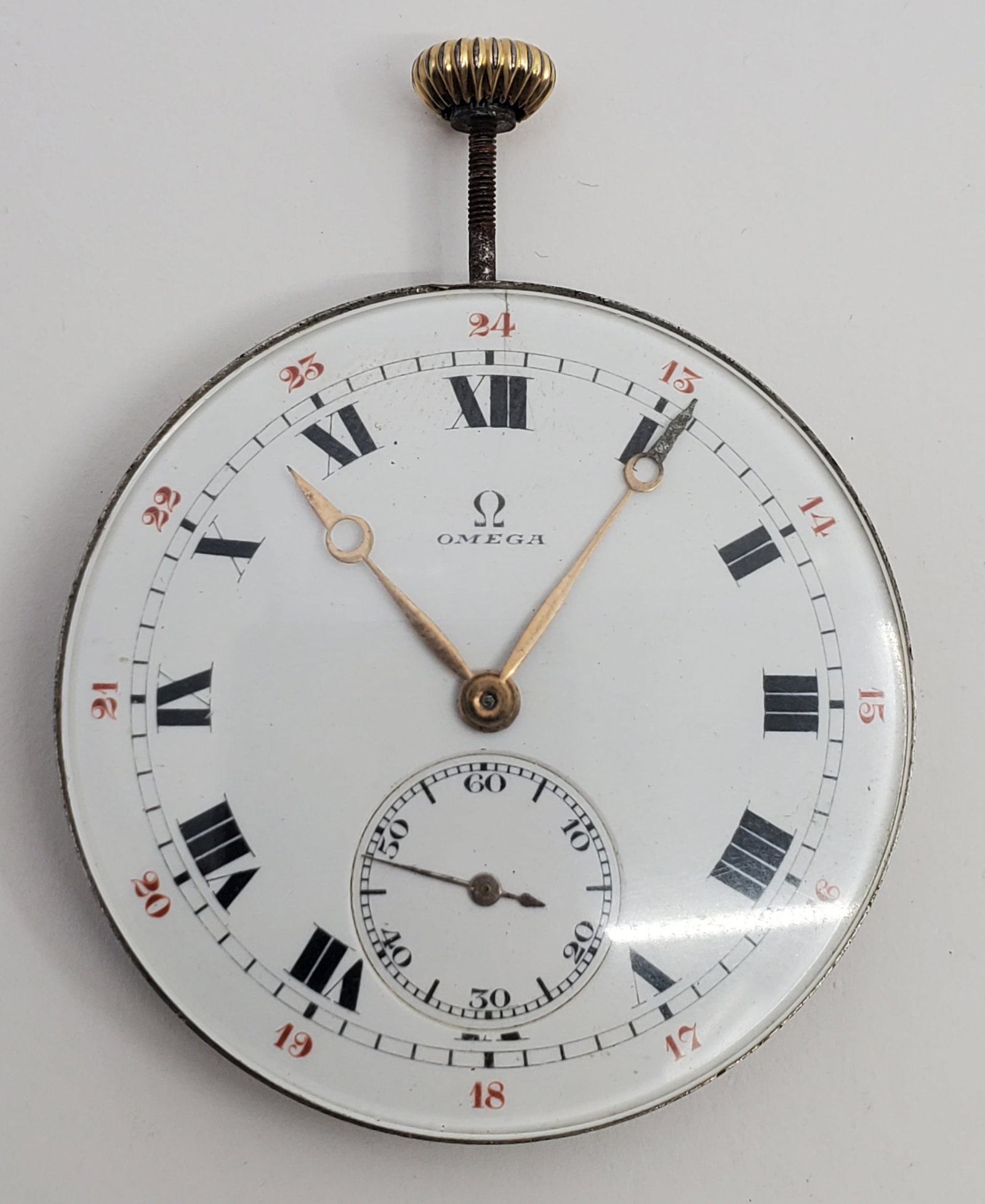 Vintage OMEGA Pocket Watck Movement: 42 mmdiameter. With crystal, crowm and stem separatelt, Probable ex gold case. Seems to be in working order.