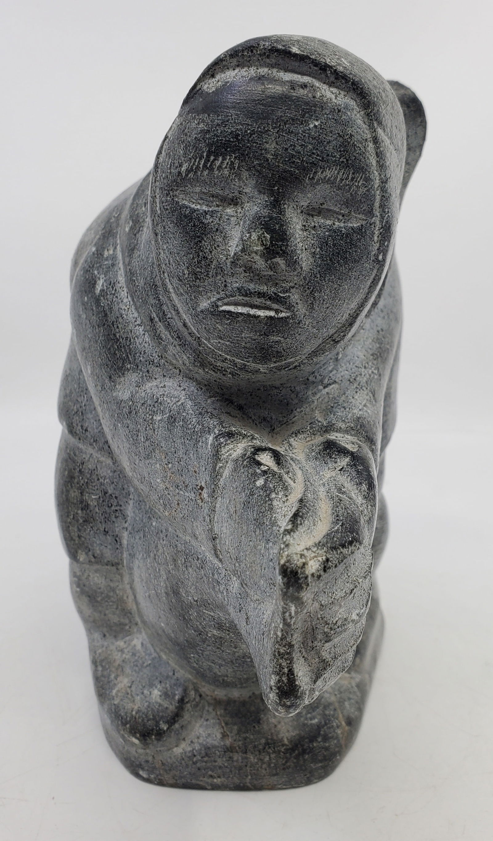 INUIT Soapstone Sculpture Woman Sitting on Seal. Signed: E-91481 DOSHPIE 3 1/2 x 6 1/2 x 6 3/4"