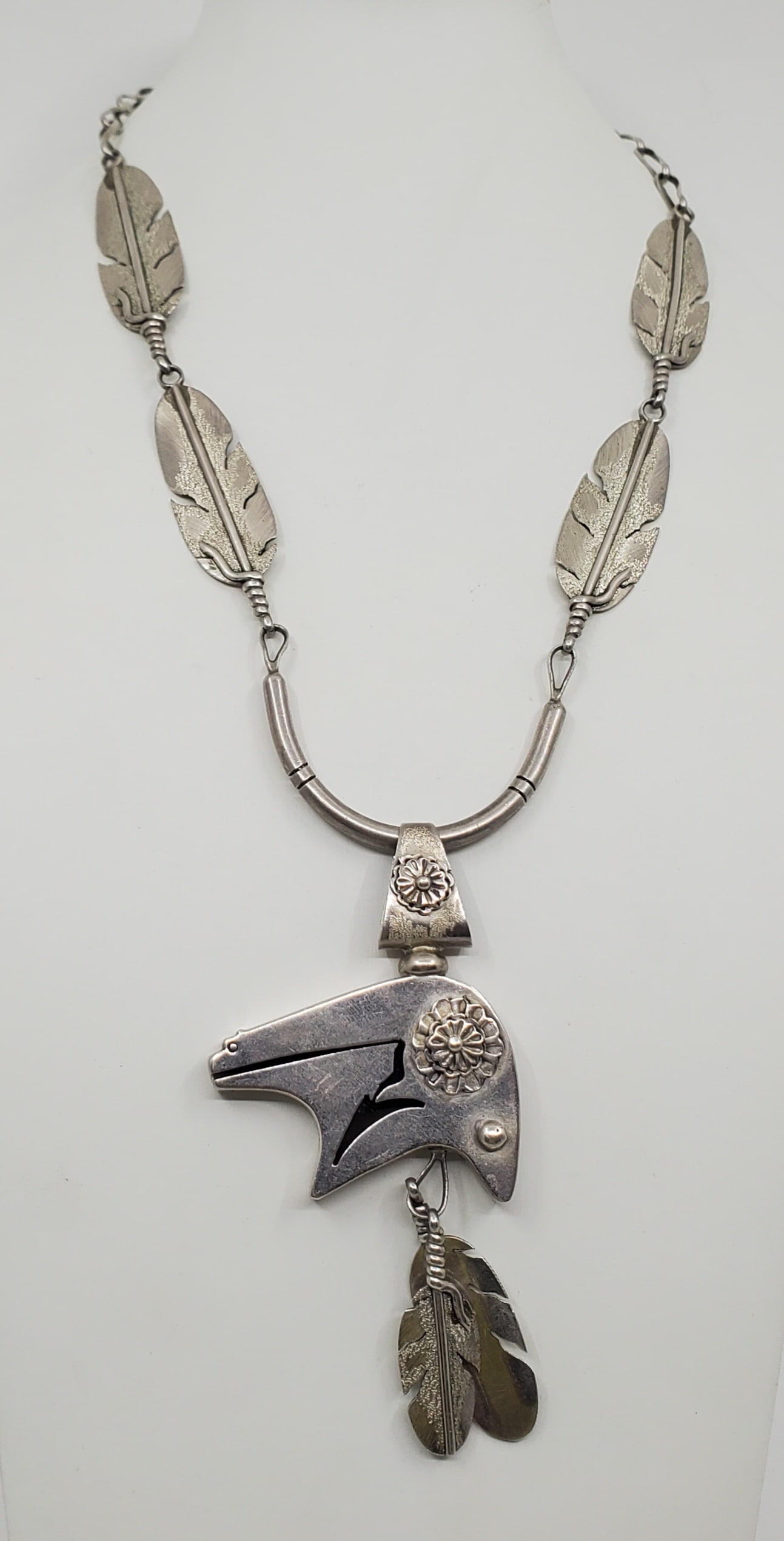 Ben Begaye, Navajo Sterling Silver Bear and Feather Necklace: Sterling Silver Necklace, representing a Bear and Feather's, signed on the back Ben Begaye 22 1/2" x 5 1/2" Weight: 68,5 g