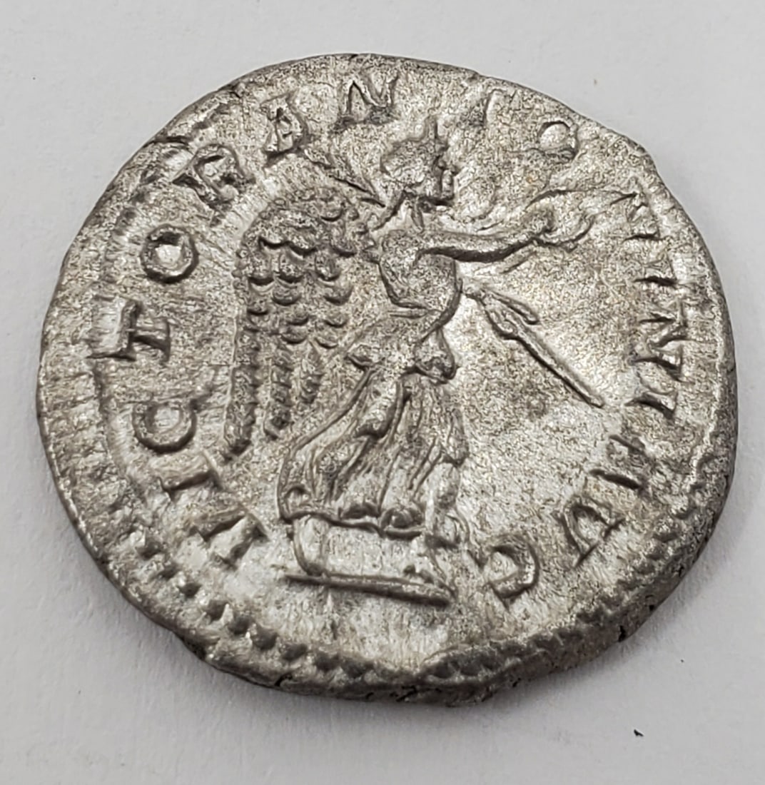 Roman Empire Silver Denarius of ELAGABALUS 218-22 CE: 17 mm, 3.33 grams. Choice condition. Reverse : VICTOR ANTONINI AVG Winged Victory presenting wreath.