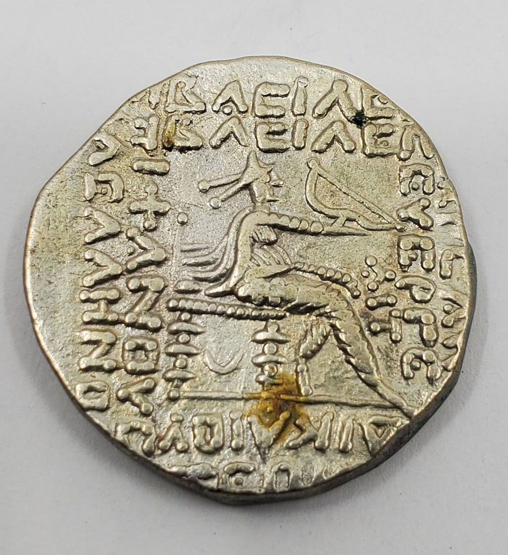 Ancient PARTHIA (Persia) Silver Tetradrachm Coin: King Phraatakes. Datedby the Seleucid calander, AIT - 311 = 2/1 BCE. Sear G.I.C. #5759 Reverse : Arsakes (founder of the dynasty) seated holding a bow. 27 mm, 14.66 grams.