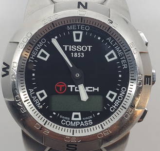 Mens TISSOT T TOUCH SMART WATCH Stainless Steel: Z253/353 Multi function. Weighs 159.40 grams. 42 mm head, 20 mm wide bracelet. Needs a new battery.