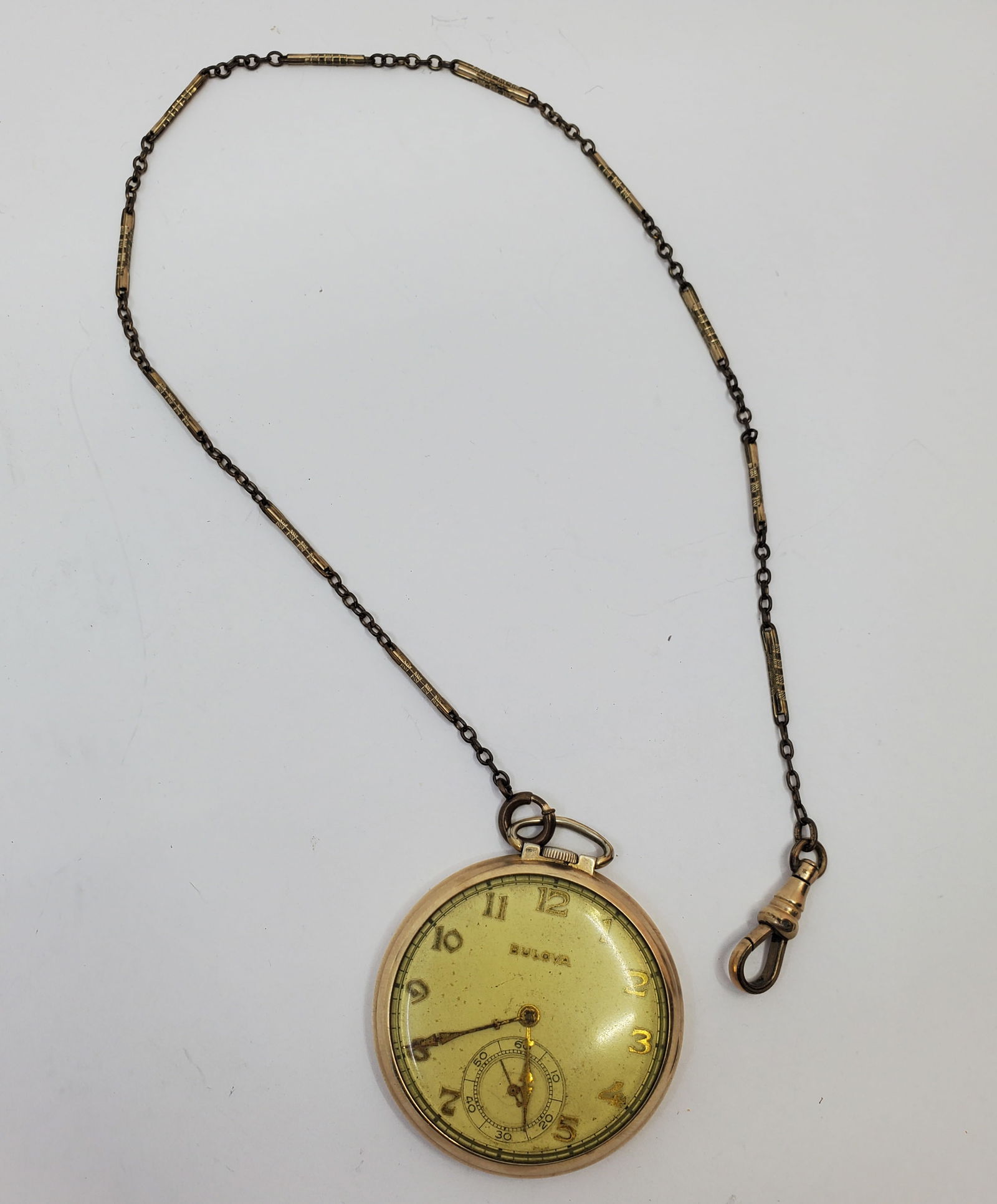 Vintage BULOVA GF Pocket Watch with Chain: 15 Jewels, Caliber 17AH, 42 mm diameter. Not in working order. With 13" chain.