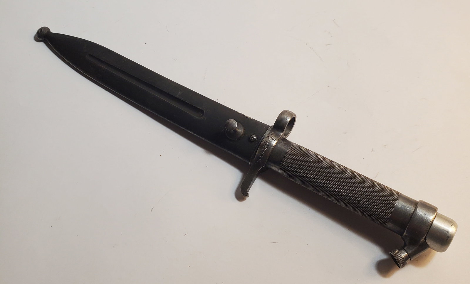 SWEDEN M1896 Mauser Bayonet by Carl Gustafs Stads Gevarsfaktori: WWII Era. The maker is identified by the crowned C mark on the blade. 13 3/8" long. With metal scabbard.
