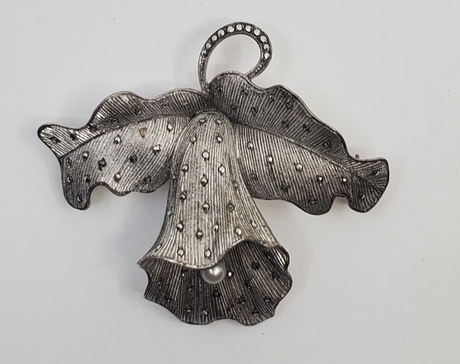 Theodor Fahrner (1859-1919) German Art Deco Sterling Silver Brooch: Sterling Silver Brooch, set with marcasites and a pearl, marked on the back Original Fahrner TF 925 2" x 2 1/4" Weight: 15,7 g