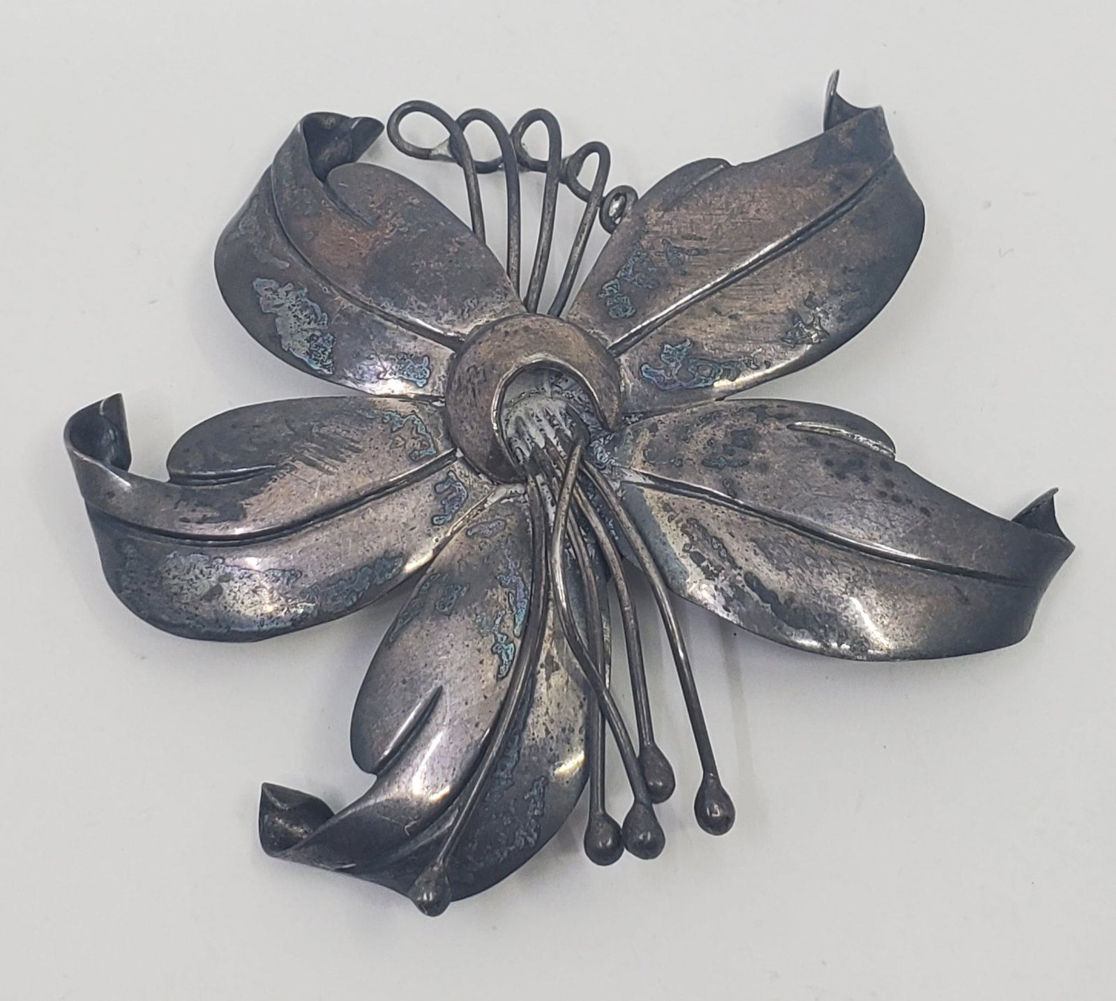 Maricela (Ysidro Garcia) Mexican Sterling Silver Flower Shaped Belt Decoration: Sterling Silver Belt Decoration, marked on the back Maricela Sterling 925 Taxco Mexico 2 1/2" x 2 1/2" Weight: 19,7 g