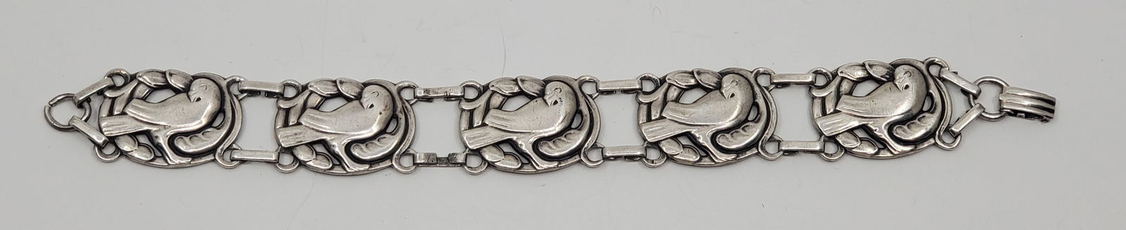 Norseland by Coro, Sterling Silver Dove Braclet: Sterling Silver Bracelet, marked on the back Sterling Coro Genuine Norseland 8 1/4" x 1" Weight: 27,3 g