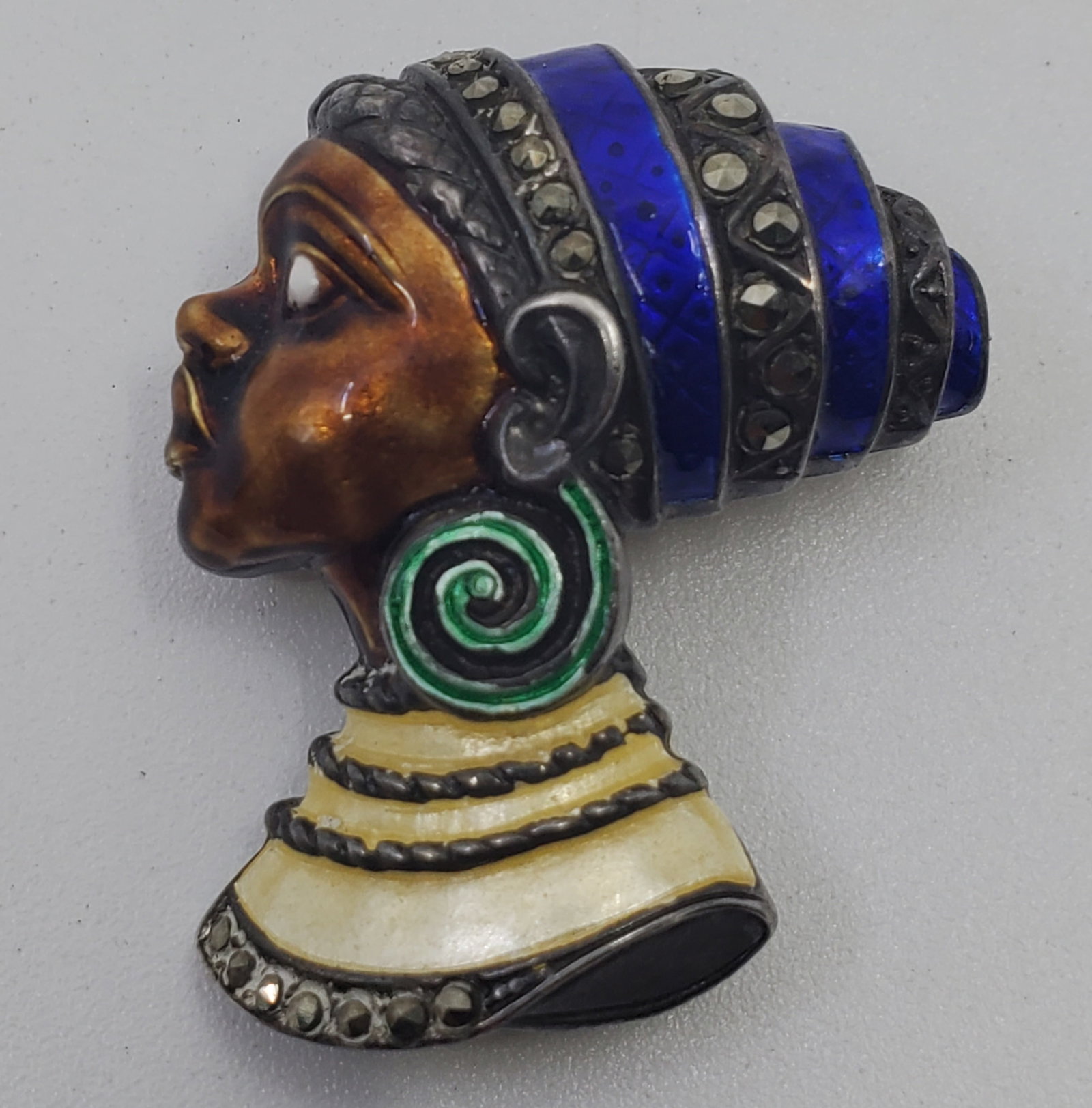 Vintage Sterling Silver Enameled Brooch: Sterling Silver Enameled Brooch, set with Marcasites, marked on the back STER ESK 1 1/4" x 1"Weight: 11,6 g
