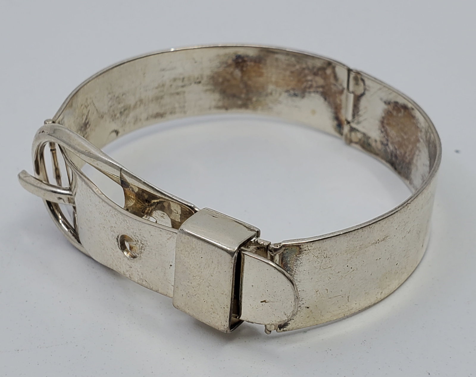 R.Duval, Sterling Silver Buckle Belt Bracelet: Sterling Silver Buckle Belt Bracelet, marked inside R. Duval Sterling 2 1/4" x 2" x 3/4"Weight: 34 g