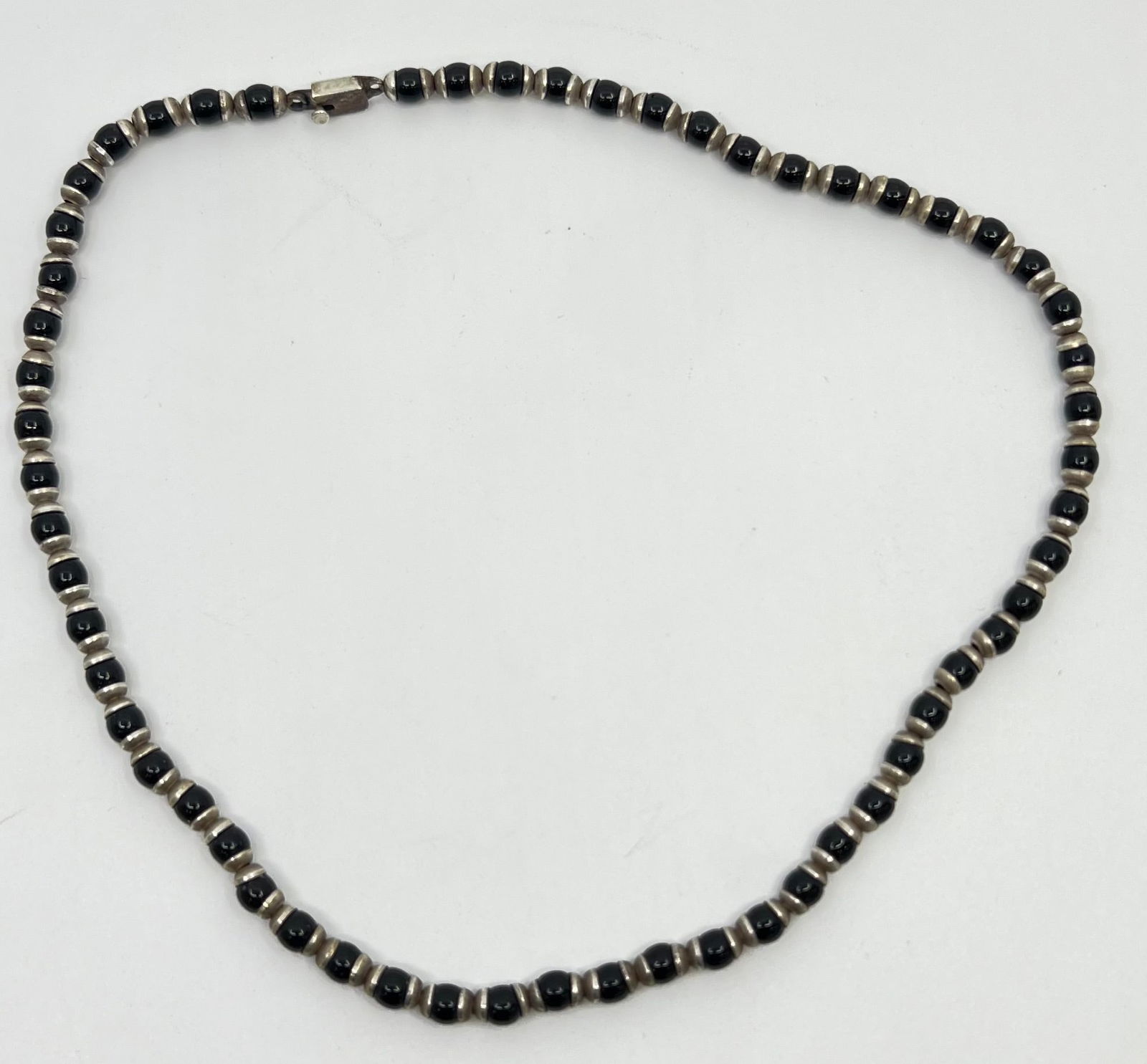 Vintage Mexican Sterling Silver and Onyx Necklace: Sterling Silver Necklace set with Onyx Beads, marked on the clasp 19"Weight: 35,9 g