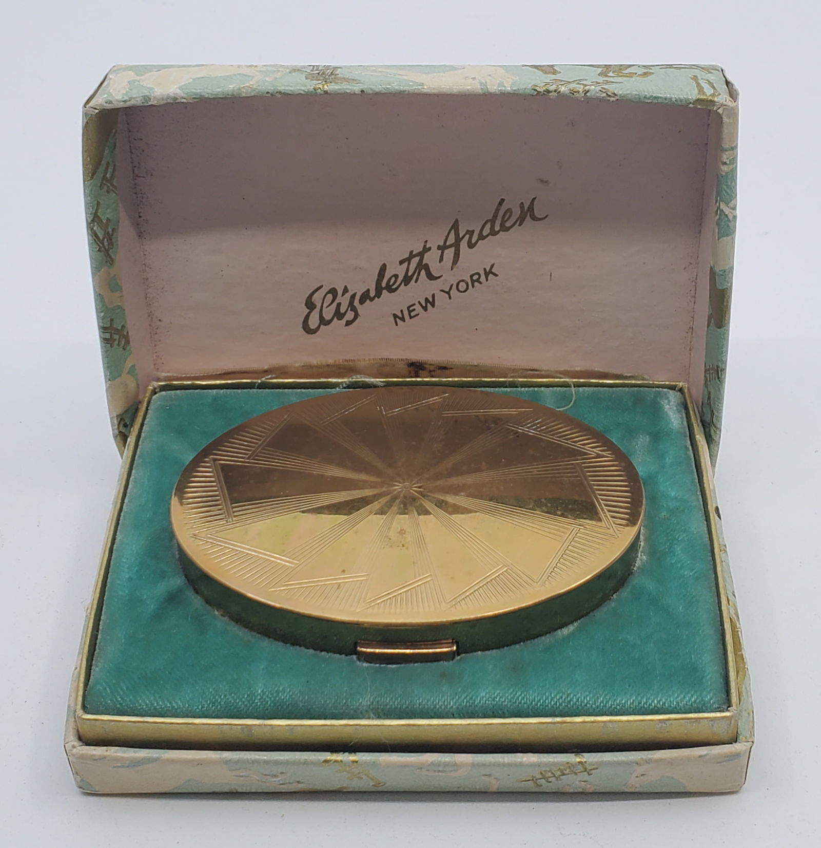 Elizabeth Arden, New-York, Vintage Compac with Box: Vintage Design Brass Compac, marked underneath Elizabeth Arden New York Made in usa, in it's original Box 3" x 2" x 1/2"