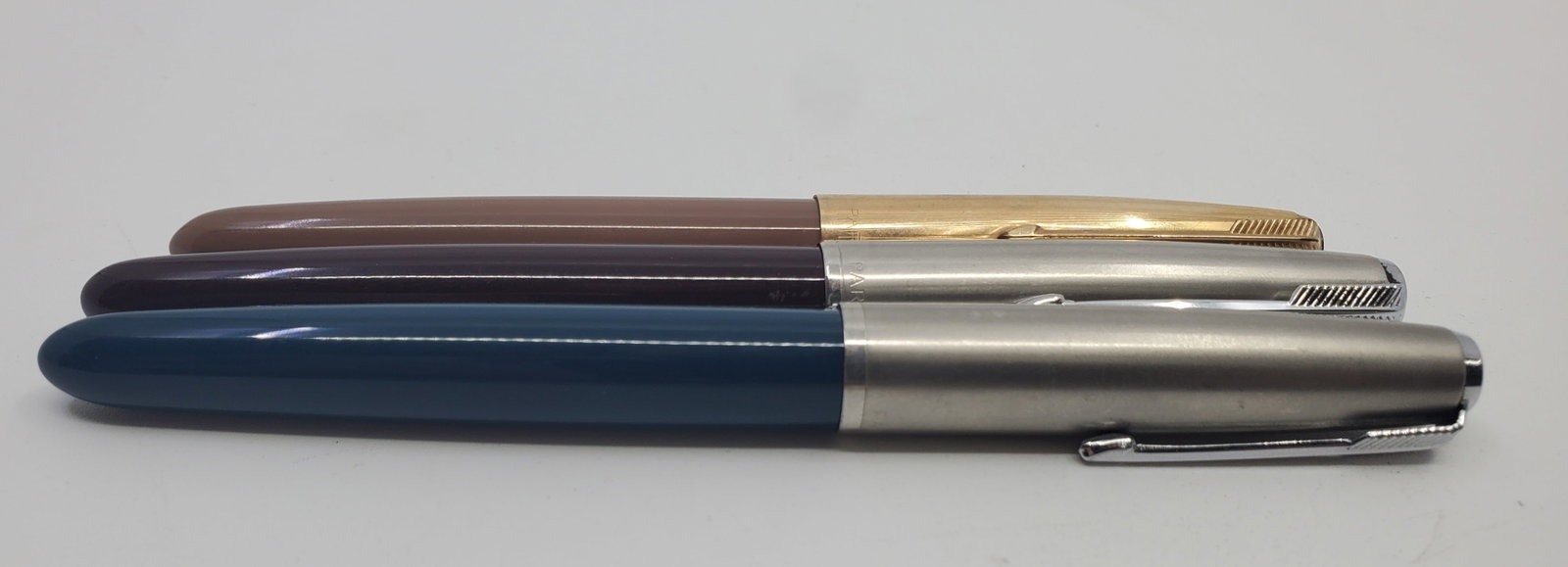 Set of 3 Parker Fountain Pen: Including : Parker Blue Foutain pen, Parker Black Fountain Pen, Parker Gold Plated Cap brownish fountain pen