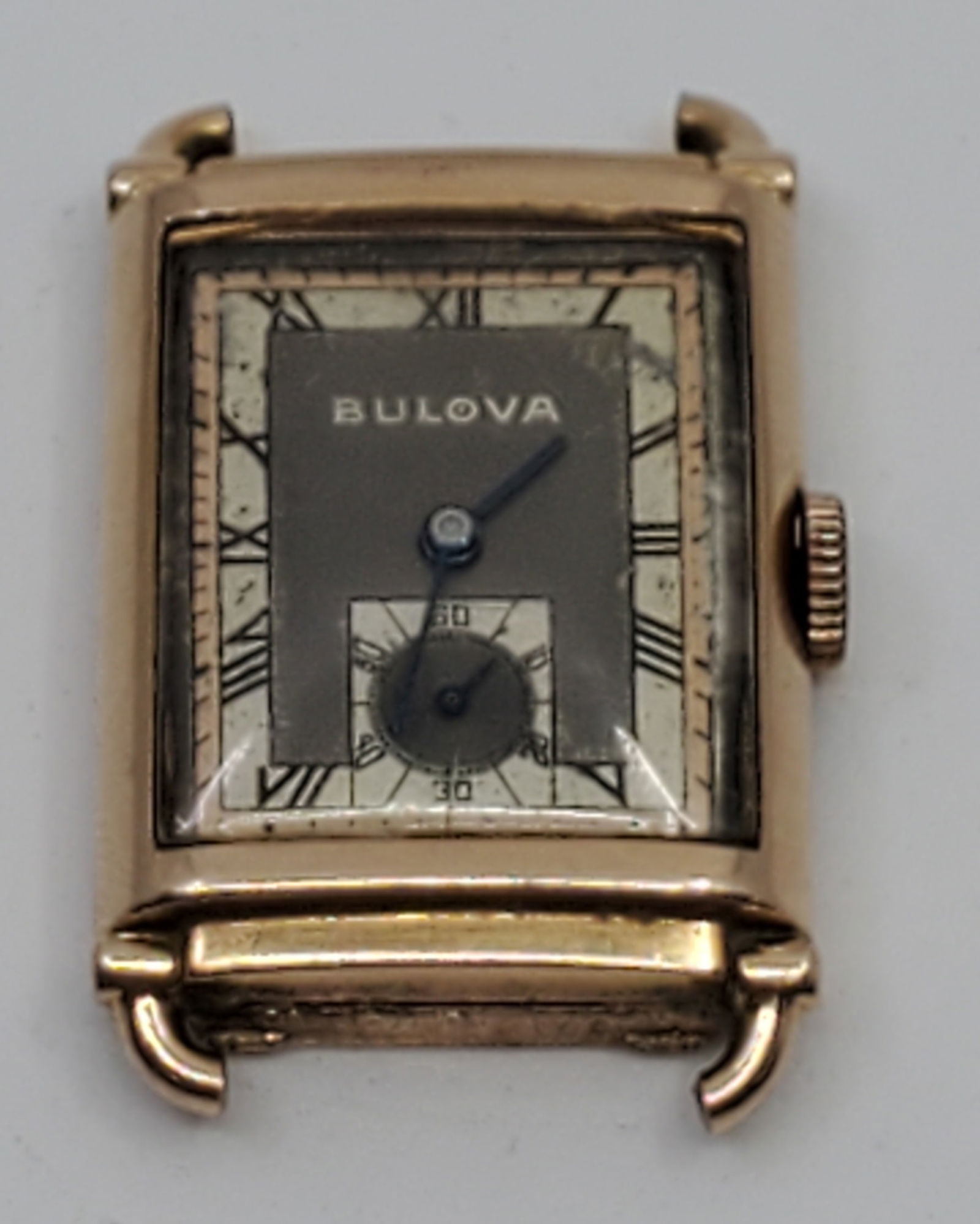 Vintage Rectangular BULOVA 14K GFArt Deco Wristwatch: 20 x 35 mm. Not in working order. Original bracelet (damaged) included.