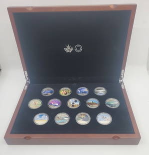 CANADA 2017 Set of 13 $10 Colourized Silver Coins - Canada's 150th: Celebrating Canada's 150th. Seet of 13 colourized, encapsulated proof coins, each containing 15.87 grams of .9999 fine silver. In wooden presentation case, with certificates.