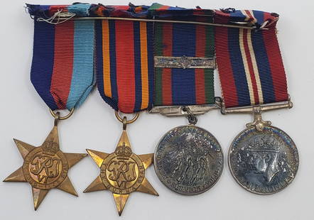 CANADA WWII 4 Piece Military Medals Set: Included are in silver, the Defense Medal 1939-1945, and the Voluntary Service Medal with Oak leaf clasp. In bronze the 1935-1945 Star, and the scarce Burma Star. All mounted on a bar, with original r