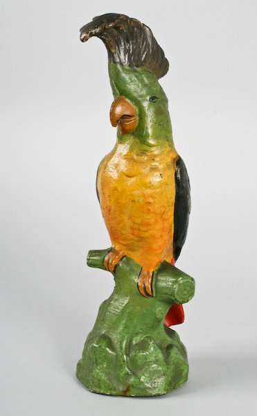 Cast Iron Parrot Doorstop and a Balancing Parrot: American School, 20th Century, Vintage Cast Iron Parrot Doorstop and a Balancing Parrot, ranging in size from 14 to 24-1/2 inches (height). Provenance: The Betty Gordon Estate.
