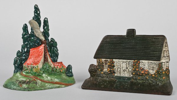 Doorstops: Cottage in the Woods and Cape Cod House: American School, 20th Century, Pair of Vintage Cast Iron Doorstops: Cottage in the Woods and Cape Cod House, ranging in size from 5-3/4 to 8 inches (height). Provenance: The Betty Gordon Estate.