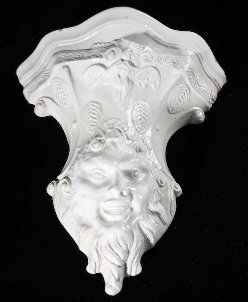 Staffordshire Salt Glaze Wall Pocket, Satyr's Head: British School, 18th Century, Staffordshire Salt Glaze Wall Pocket in the form of a Satyr's Head, all white, circa 1745-1750, 7-1/2 x 6 x 2 inches. Provenance: Joseph Downs, Winterthur, DE; Price Glov