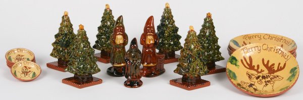 Lester Breininger, 18 Christmas Figurines and Plates: Lester Breininger (American, 20th Century) Collection of eighteen Pennsylvania German Glazed Redware Christmas Figurines and Small Plates, ranging in size from 2-1/2 to 5-1/2 inches (plate diameter) a