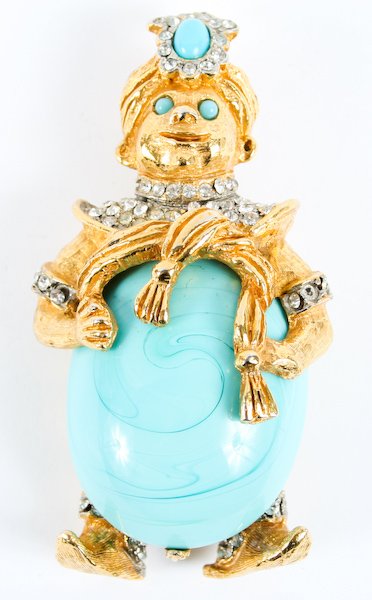 Collection of Kenneth Jay Lane Costume Jewelry: Collection of four pieces of Vintage Kenneth Jay Lane Costume Jewelry including a rhinestone and gold acanthus bracelet, a rhinestone cobra cocktail ring, a rhinestone genie brooch and a pair of rhine