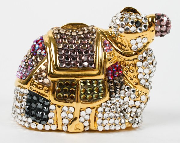 Judith Leiber Seated Camel Minaudiere Pillbox: Judith Leiber Vintage Seated Camel Minaudiere Pillbox with Multicolor Crystal Embellishment, stamped within "Judith Leiber", with original protective signature bag, 1-1/2 x 2 x 1-1/4 inches. Provenanc