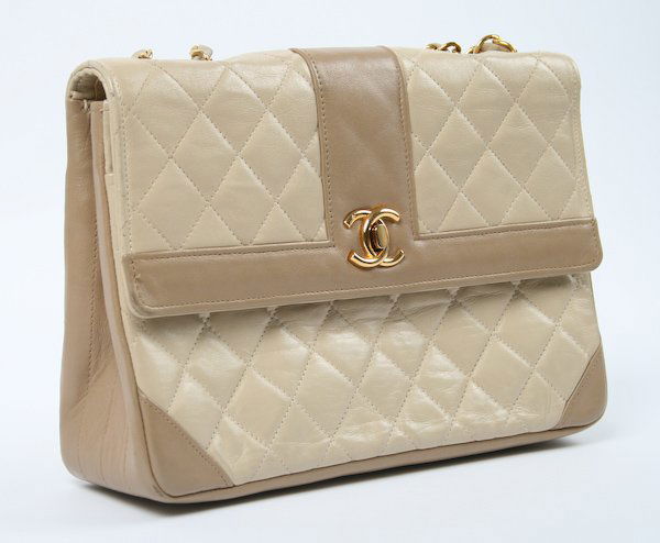 Chanel Quilted Leather Two Tone Beige Flap Bag: Chanel Quilted Leather Two Tone Beige Flap Bag, with gold hardware, double strap, original storage bag and box, 6-1/2 x 9-1/2 x 2-1/2 inches. Provenance: The Betty Gordon Estate.