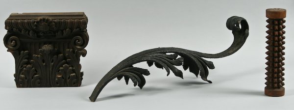Three Decorative Architectural Objects: Three Decorative Architectural Objects Including a Carved Oak Corinthian Capital, a Hand Carved Tramp Art Cylinder and a Cast Iron Scroll-Shape Acanthus, ranging from 10-3/4 x 12 x 3-1/2 to 26-1/2 x 4
