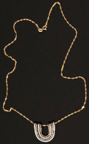 Brown and White Diamond Pendant: Brown and white diamond pendant: 18k white gold & antiqued (darkened) four-piece pendant, u-shaped design, each bead set with round full cut diamonds. Two white two brown. 22x22 mm. approx. Overall si