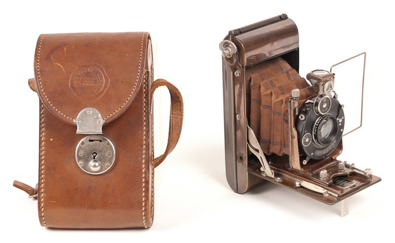 Watch Pocket Carbine No. 6 Tropical Roll Film Camera: Watch Pocket Carbine Model No. 6 Tropical Roll Film Camera (Serial No. D4043.) with Carl Zeiss Jena Tessar Lens, Compur Shutter and Leather Case. Manufactured by Houghton-Butcher in London, England ci
