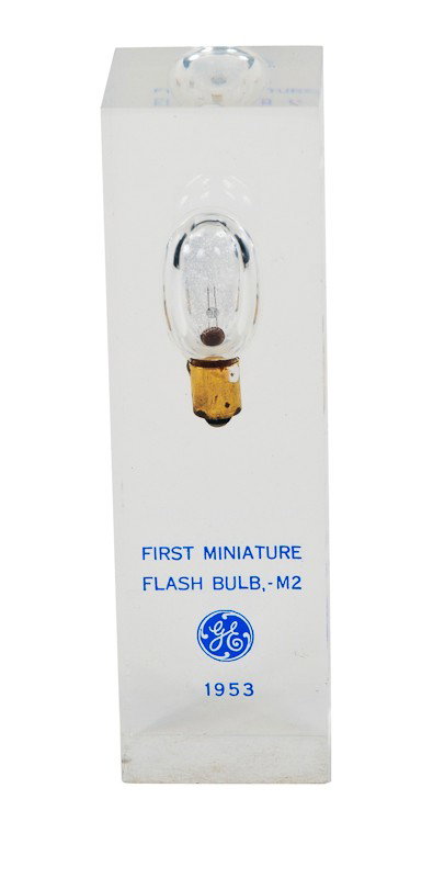 First Miniature Flash Bulb, M2 Manufactured by G.E : First Miniature Flash Bulb, M2 Manufactured by G.E. in 1953. Encapsulated in Resin. Provenance: The Kaprelian Camera Collection, Philadelphia, PA.