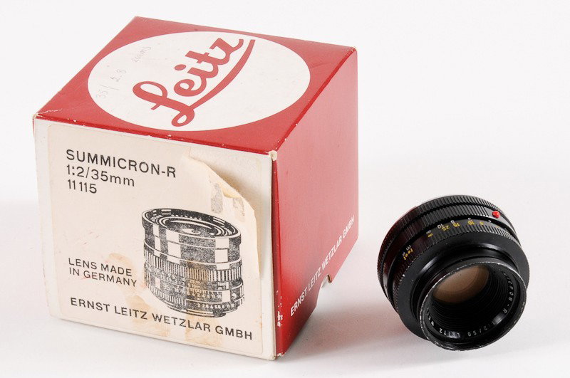 Summicron-R f/2 50mm Bayonet-Mount Lens: Summicron-R f/2 50mm Bayonet-Mount Lens (Serial No. 2192513) with Original Box. Manufactured by Ernst Leitz in Wetzlar, Germany. Provenance: The Kaprelian Camera Collection, Philadelphia, PA.