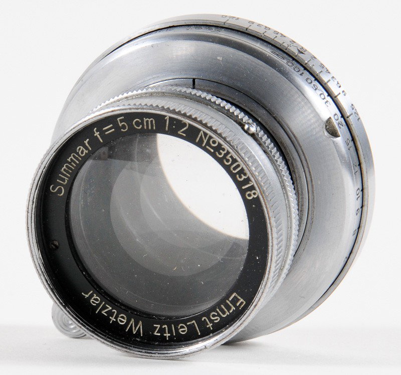 Summar f/2 5cm Leica Screw-Mount Lens: Summar f/2 5cm Leica Screw-Mount Lens (Serial No. 350318), Chrome. Manufactured by Ernst Leitz in Wetzlar, Germany. Provenance: The Kaprelian Camera Collection, Philadelphia, PA.