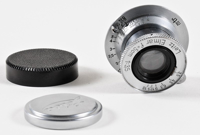 Elmar f/3.5 50mm Leica Screw-Mount Lens: Elmar f/3.5 50mm Leica Screw-Mount Lens (Serial No. 263763), Chrome. Manufactured by Ernst Leitz in Wetzlar, Germany. Provenance: The Kaprelian Camera Collection, Philadelphia, PA.