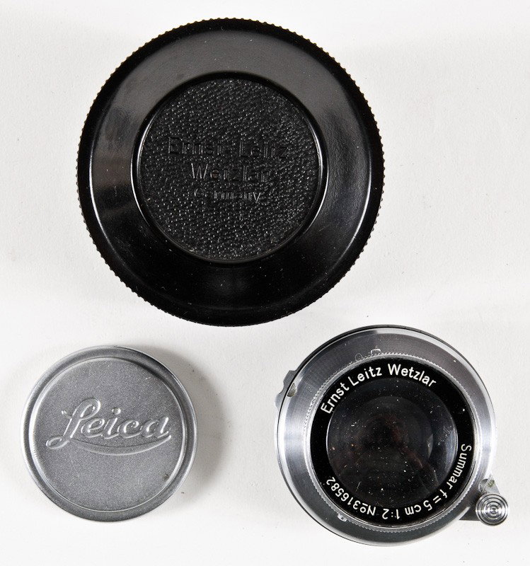 Summar f/2 5cm Leica Chrome Screw-Mount Lens: Summar f/2 5cm Leica Chrome Screw-Mount Lens (Serial No. 316582) with a Bakelite Lens Case. Manufactured by Ernst Leitz in Wetzlar, Germany. Provenance: The Kaprelian Camera Collection, Philadelphia, 
