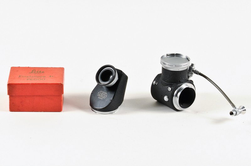 Leitz, Visoflex with Rare Cable and Einstellupe: Leitz, Visoflex (No. 26413) with Rare Cable and Einstellupe 4x PEGOO in Original Box for Leica M Series. Manufactured by Ernst Leitz in Wetzlar, Germany. Provenance: The Kaprelian Camera Collection, P