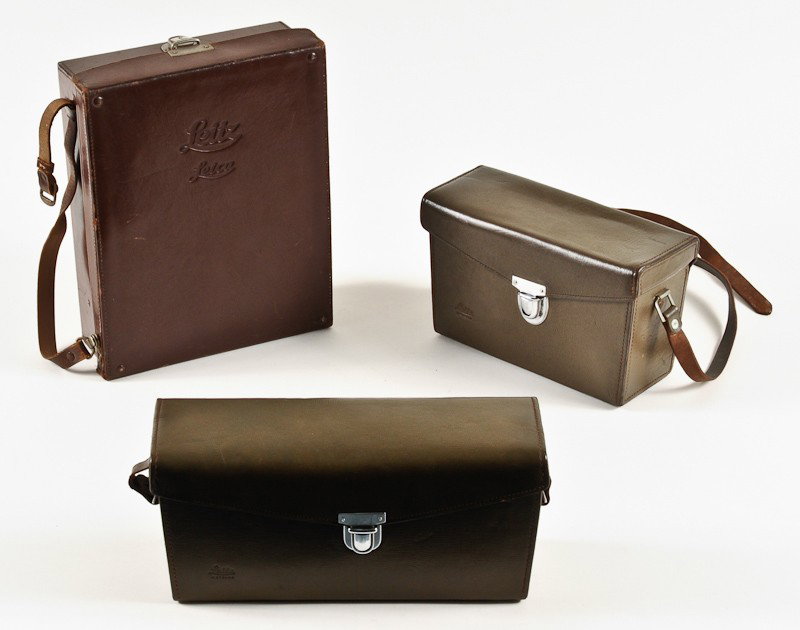Group of 3 Leather Leica Camera Cases: Group of 3 Leather Leica Camera Cases including Brown and (2) Olive. Manufactured by Ernst Leitz in Wetzlar, Germany. Provenance: The Kaprelian Camera Collection, Philadelphia, PA.