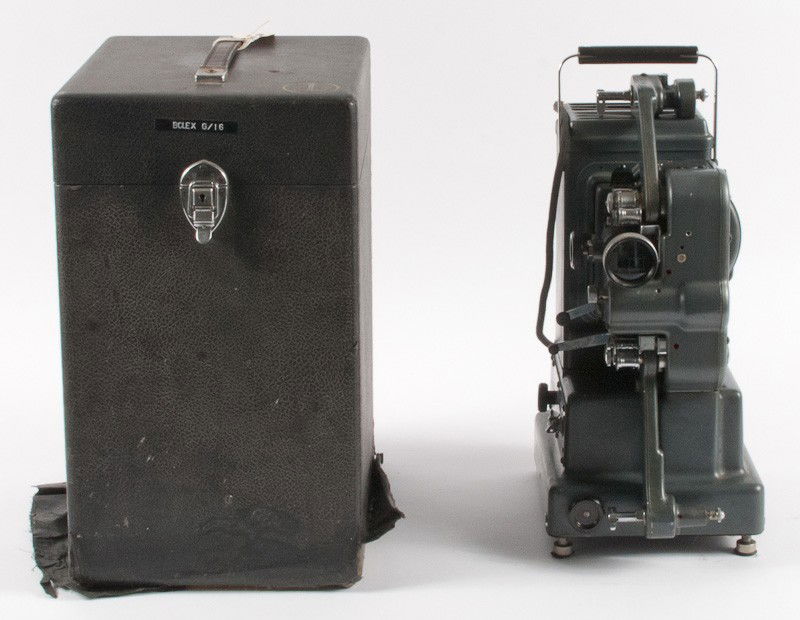 Bolex G 16 Single Film Format 16mm Projector: Bolex G 16 Single Film Format 16mm Motion Picture Projector (Serial No. 2000059). Including a Wooden Carrying Case. Manufactured by Paillard, Switzerland circa 1941. (Outer covering of case is coming