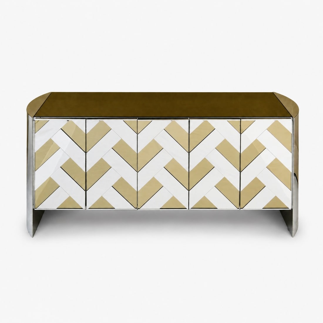 Mirrored Chevron Herringbone Ello Style Credenza, Circa 1970's: Attributed to Ello, mirrored and steel exterior, rounded sides, white interior with adjustable shelves The collection of Frank and Irene Giuffrida, owners of the famous Hilltop Steakhouse, Saugus, MA