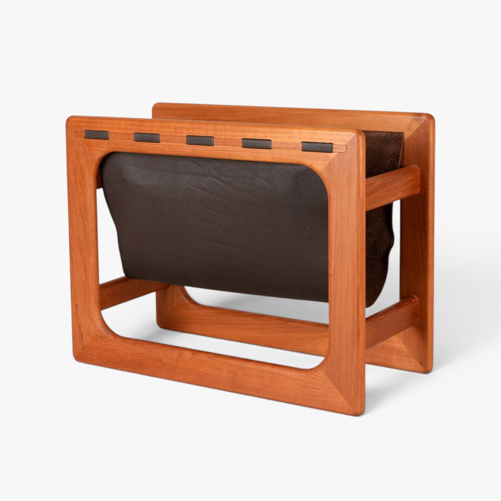 Danish Mid century Magazine Rack: Design of Aksel Kjersgaard Salin Mobler, teak and dark brown leather The collection of Frank and Irene Giuffrida, owners of the famous Hilltop Steakhouse, Saugus, MA