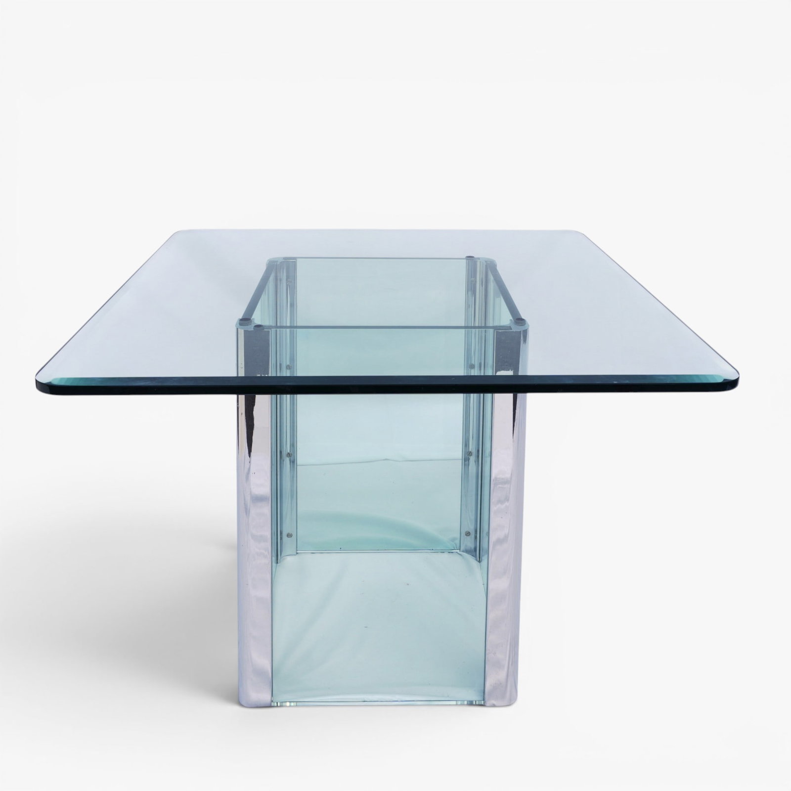 Leon Rosen for Pace Glass and Chrome Table, Circa 1970's: Heavy thick glass beveled top and glass sides supported by chrome steel corners The collection of Frank and Irene Giuffrida, owners of the famous Hilltop Steakhouse, Saugus, MA