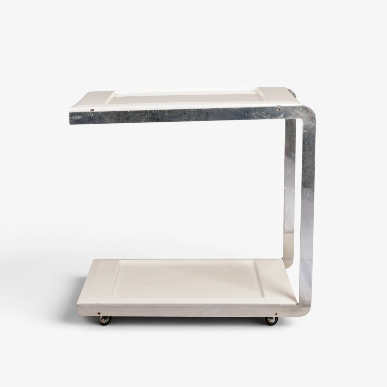 Ernesto Hauner Tea Cart by Mobilinea, Brazil, circa 1960's: Rare Brazilian mid century modern design, aluminum 'C' shape frame and fiberglass trays on low profile caster feet The collection of Frank and Irene Giuffrida, owners of the famous Hilltop Steakhouse,