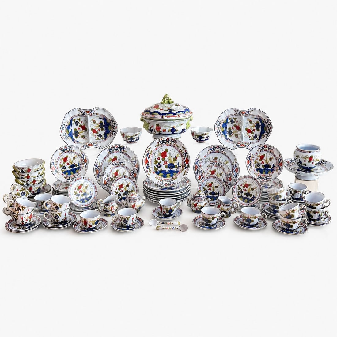 102 piece Vintage Italian Garofano Faenza Bleu Carnation Hand Painted Dinner Service: Comprising: Large pitcher, serving bowl, 3 serving plates and coffee pot (pictured in second and third photographs); 9 dinner plates, 8 salad plates, 9 bread plates, 20 tea cups, 21 saucers, 2