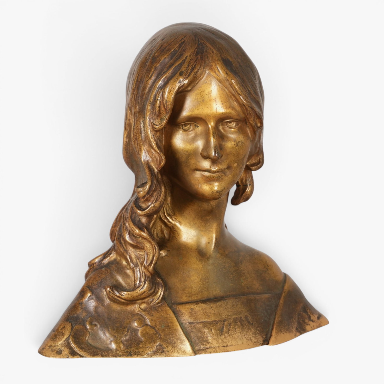 Bronze Bust of a Girl, Attributed to Leon Noel Delagrange (1872-1910): Signed on back Delagrange, stamp on back reads "Societe Des De Paris 8627" The collection of Frank and Irene Giuffrida, owners of the famous Hilltop Steakhouse, Saugus, MA
