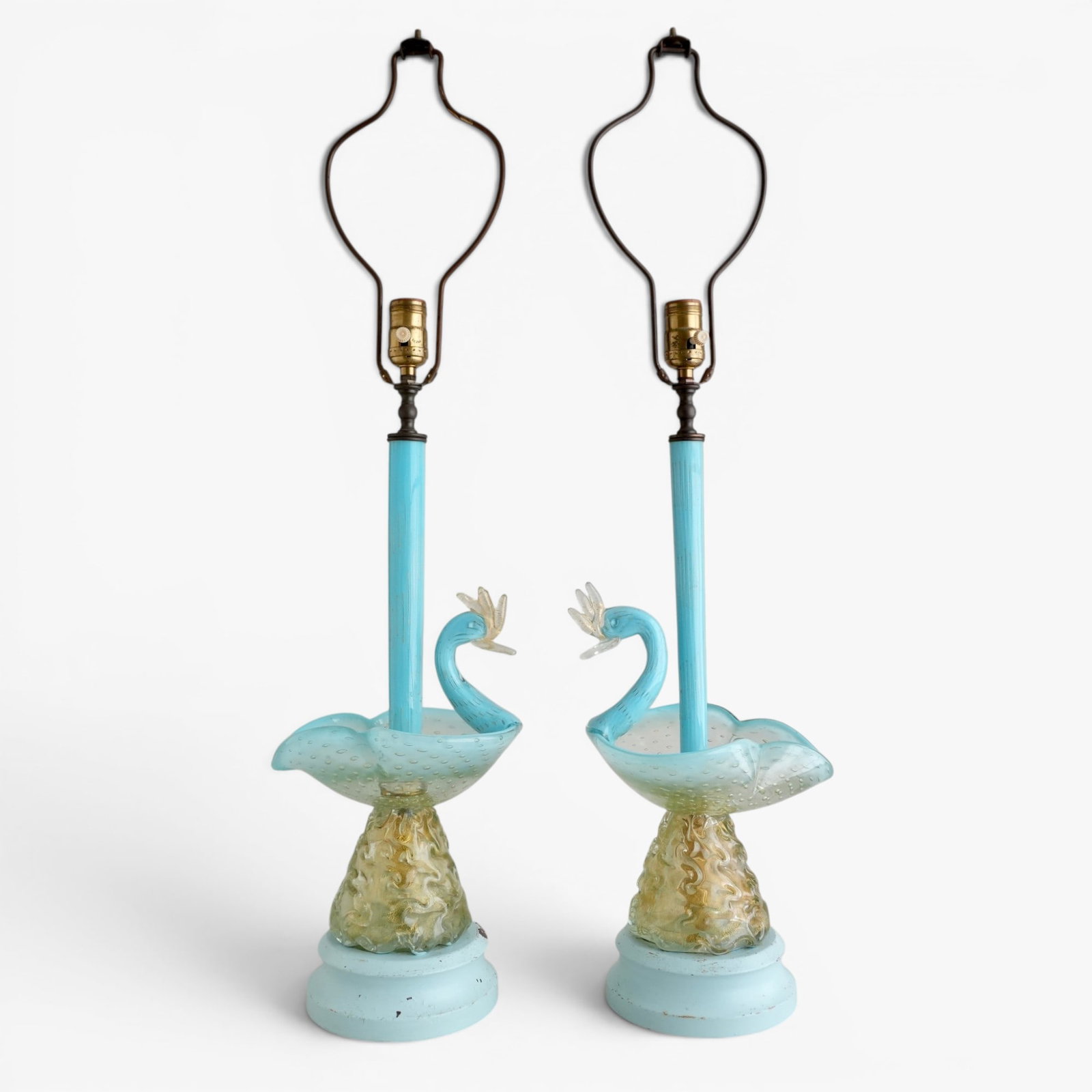 A Pair of Rare Murano Glasss Swan Lamps, Italy, Circa 1940's: Hand blown robins egg blue and translucent gold fleck glass mounted on painted metal bases. Art glass, Hollywood regency, Italian glass, vintage Murano glass The collection of Frank and Irene