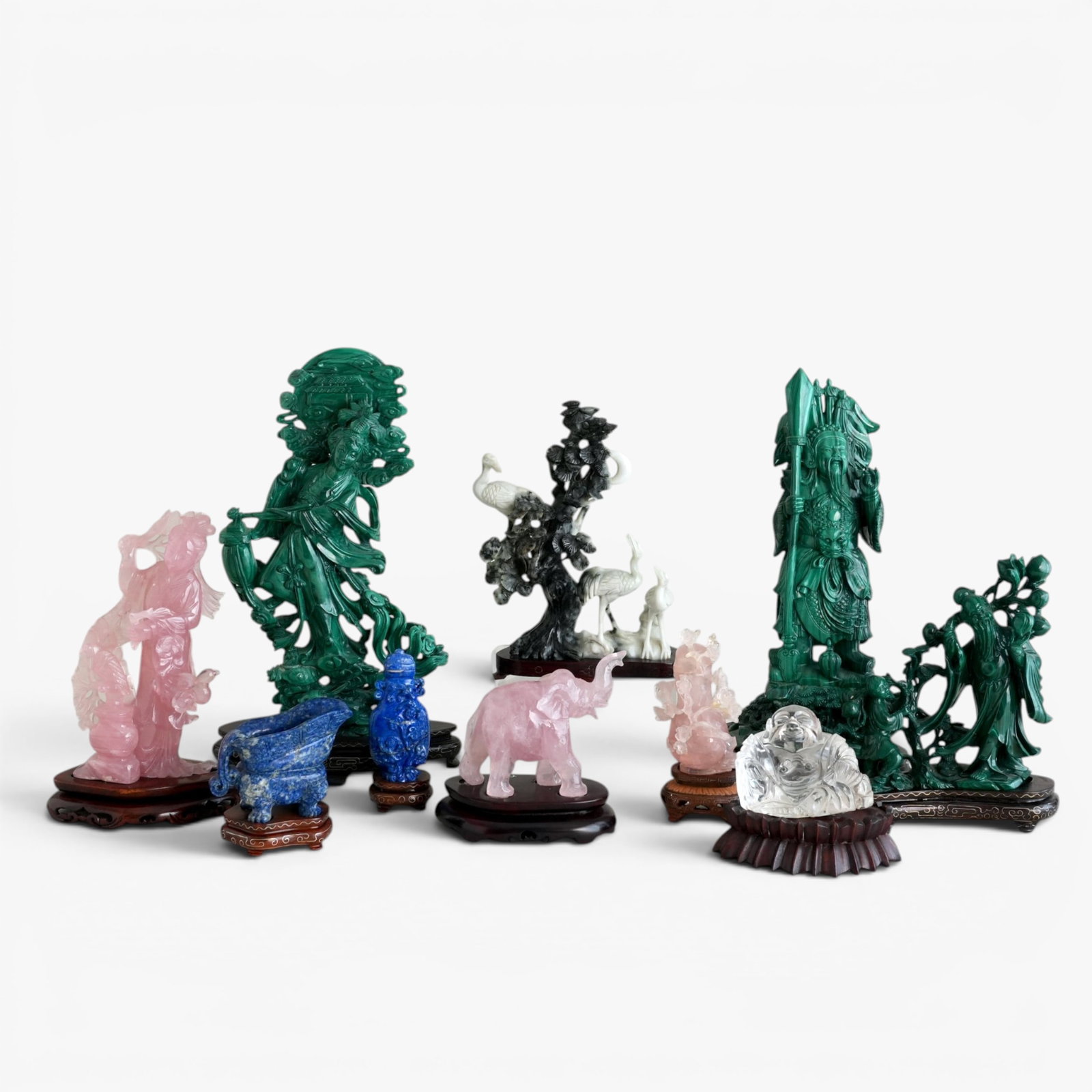 A Group of Eight Chinese Stone Sculptures and a Clear Glass Buddha (1 of 6)