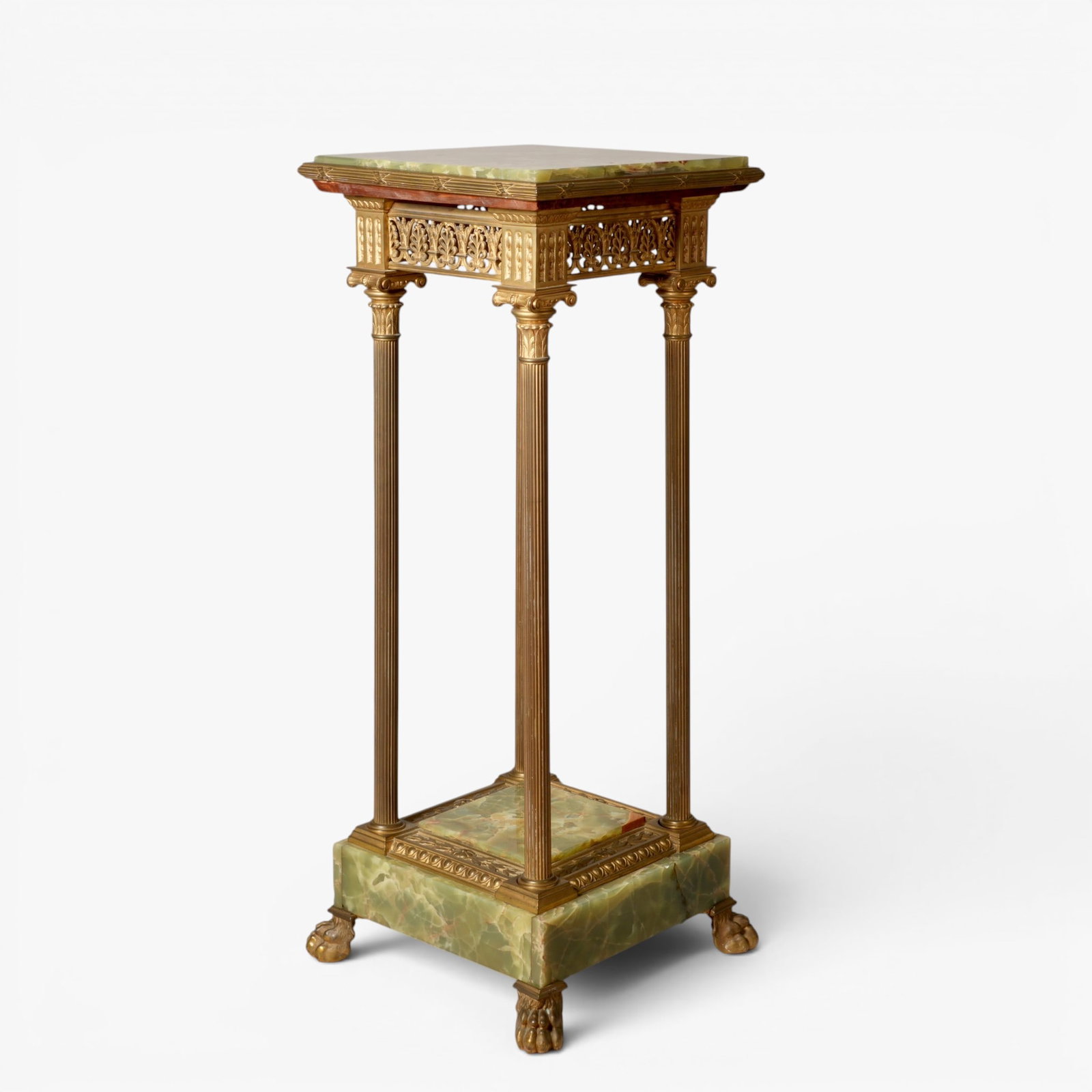 Empire Style Green Onyx and Gilt Bronze Table: Vintage table with green onyx squared top above an openwork acanthus skirt and supported by bronze column legs with corinthian type capitals, the base with green onyx stone set within foliate gilt