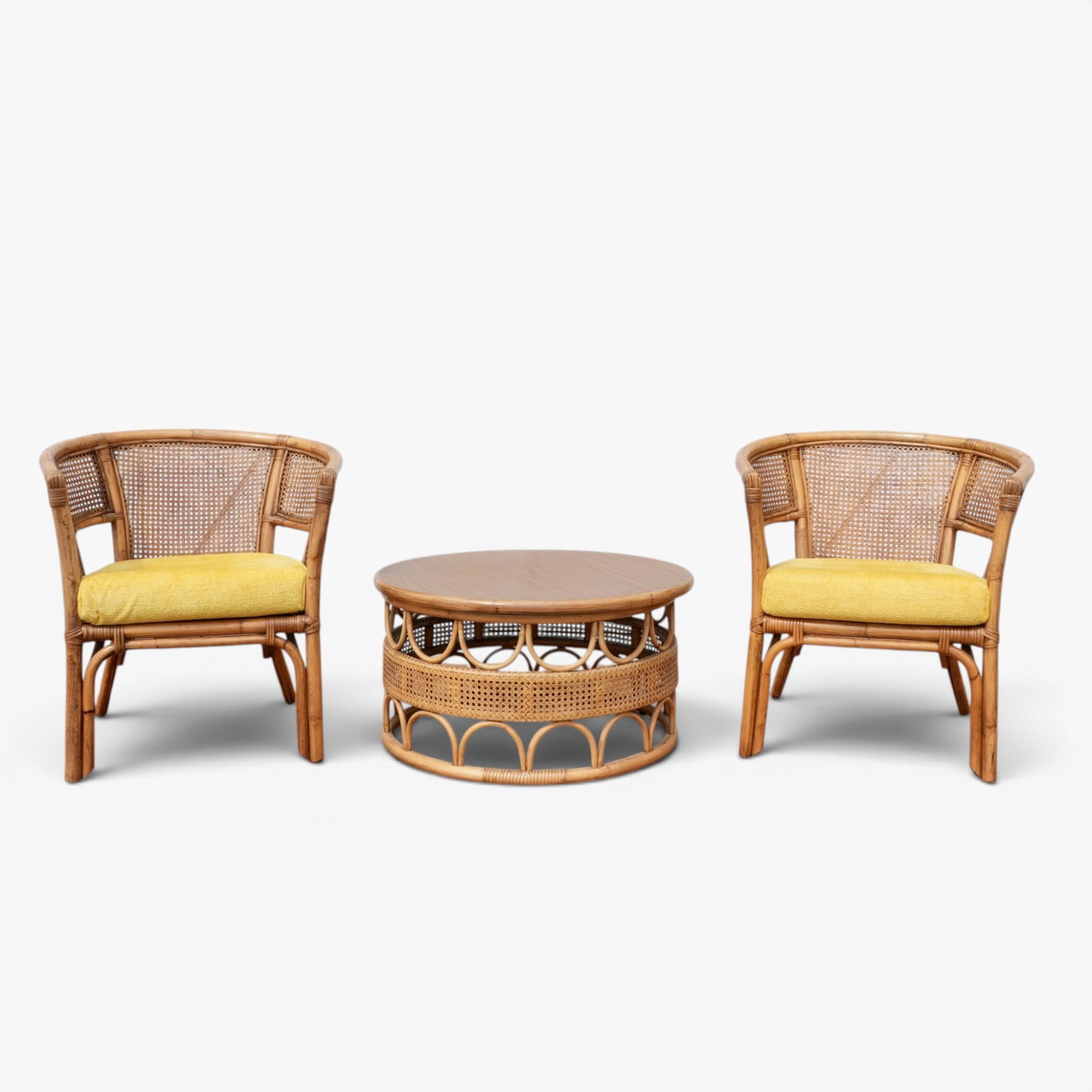 A Pair of Bamboo and Rattan Rounded Back Armchairs with a Circular Coffee Table (1 of 5)