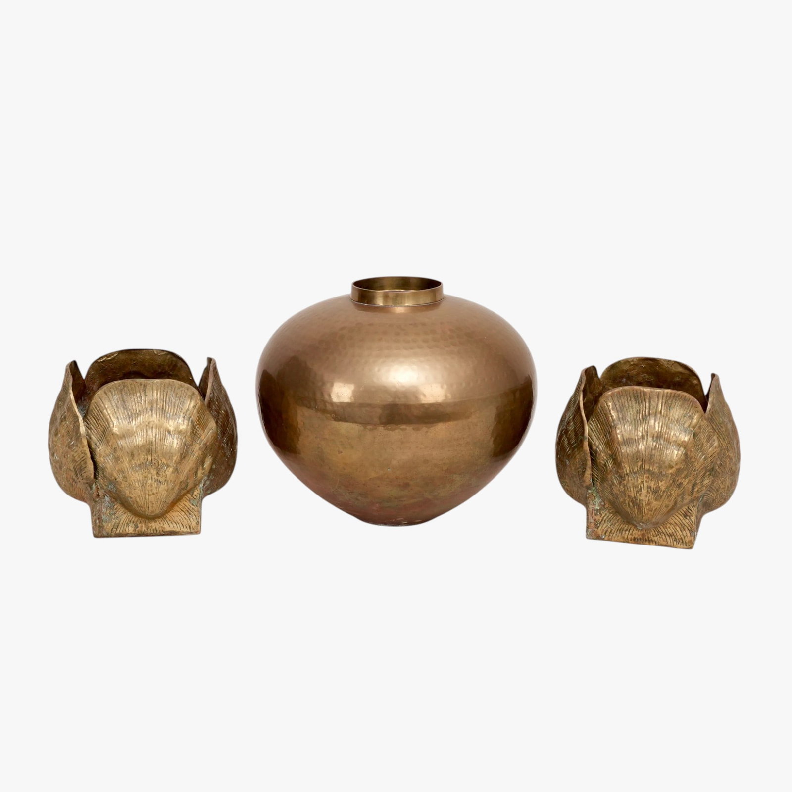 Two Brass Shell Form Planters and a Vase: the planters formed as four adjoining shells; together with an ovoid vase rising to a short rim, shell forms measure approx.: 8" H x 8.5" W The collection of Frank and Irene Giuffrida, owners of the