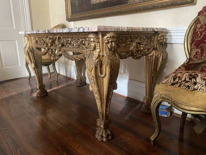 SUPERB GILT WOOD AND ORIGINAL MARBLE TOP CENTER TABLE WILLIAM KENT: SUPERB GILT WOOD CENTER TABLE POSSIBLY BY WILLIAM KENT. RETAINING ITS ORIGINAL MARBLE TOP. INCREDIBLE CARVING THOUGHOUT. CARVED IN THE ROUND. EXCEPTIONAL DETAIL IN THIS PIECE! FROM OLD SOUTHER ESTATE.