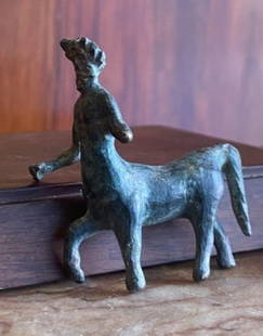 Rare Small Roman Bronze sculpture of a Minotaur antiquity?: From a fine estate. A small Roman bronze figure of a minotaur possibly first century